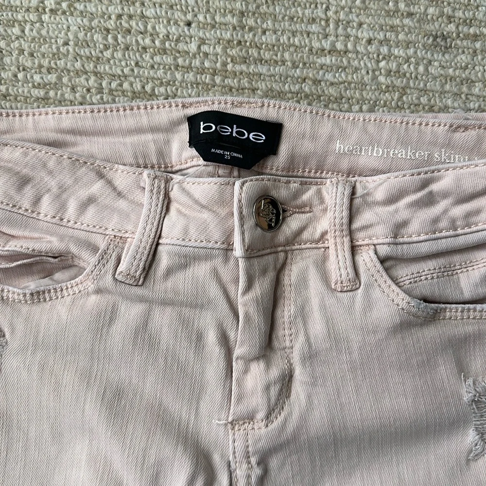 BEBE ripped skinny jeans. - Picture 2 of 4